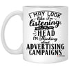 Funny Advertising Manager Mug I May Look Like I'm Listening But In My Head I'm Thinking About Advertising Campaigns Coffee Cup 11oz White XP8434