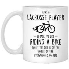 Funny Being A Lacrosse Player Is Easy It's Like Riding A Bike Except Coffee Cup 11oz White XP8434