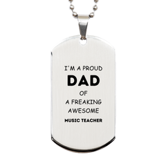 Music Teacher Gifts. Proud Dad of a freaking Awesome Music Teacher. Silver Dog Tag for Music Teacher. Great Gift for Him. Fathers Day Gift. Unique Dad Pendant