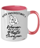 Plastic Surgeon Mug Never Underestimate A Woman Who Is Also A Plastic Surgeon Coffee Cup Two Tone Pink 11oz