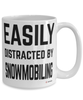Funny Snowmobiler Mug Easily Distracted By Snowmobiling Coffee Cup 15oz White