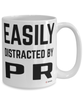 Funny Public Relations Specialist Mug Easily Distracted By Pr Coffee Cup 15oz White