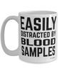 Funny Phlebotomist Mug Easily Distracted By Blood Samples Coffee Cup 15oz White