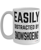 Funny Snowshoeing Mug Easily Distracted By Snowshoeing Coffee Cup 15oz White