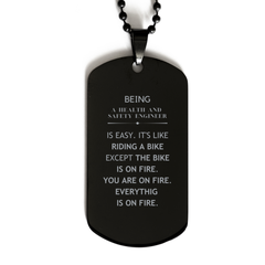 Sarcastic Health and Safety Engineer Gifts, Birthday Christmas Unique Black Dog Tag For Health and Safety Engineer for Coworkers, Men, Women, Friends Being Health and Safety Engineer is Easy. It's Like Riding A Bike Except The Bike Is On Fire. You Are On