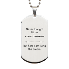 Funny Drug Counselor Gifts, Never thought I'd be Drug Counselor, Appreciation Birthday Silver Dog Tag for Men, Women, Friends, Coworkers