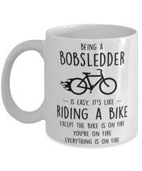 Funny Being A Bobsledder Is Easy It's Like Riding A Bike Except Coffee Mug White