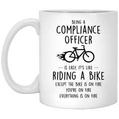 Funny Being A Compliance Officer Is Easy It's Like Riding A Bike Except Coffee Cup 11oz White XP8434