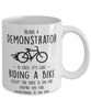 Funny Being A Demonstrator Is Easy It's Like Riding A Bike Except Coffee Mug White