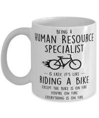 Funny Being A Human Resource Specialist Is Easy It's Like Riding A Bike Except Coffee Mug White