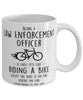 Funny Being A Law Enforcement Officer Is Easy It's Like Riding A Bike Except Coffee Mug White