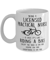 Funny Being A Licensed Practical Nurse Is Easy It's Like Riding A Bike Except Coffee Mug White