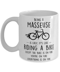 Funny Being A Masseuse Is Easy It's Like Riding A Bike Except Coffee Mug White