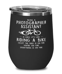 Funny Being A Photographer Assistant Is Easy It's Like Riding A Bike Except Wine Glass 12oz Stainless Steel Black
