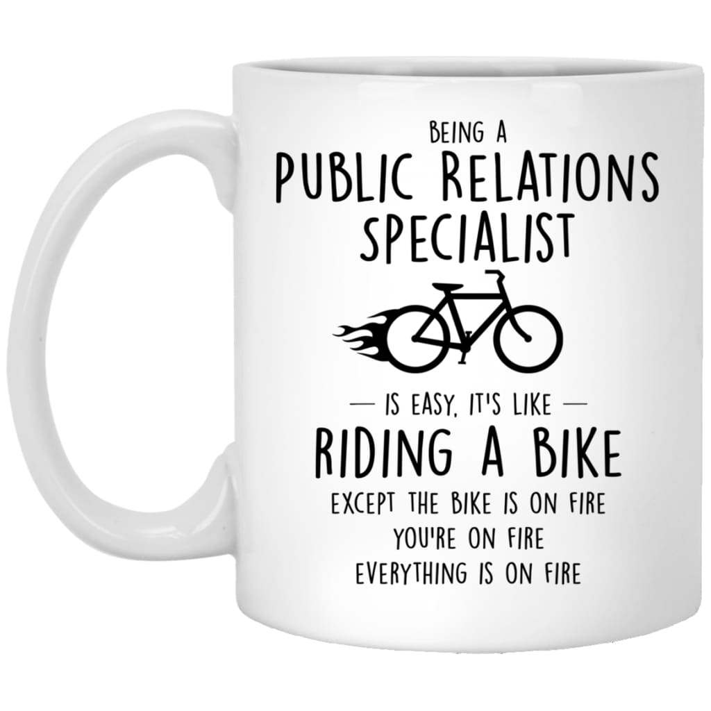 Funny Being A Public Relations Specialist Is Easy It's Like Riding A Bike Except Coffee Mug 11oz White XP8434