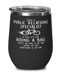 Funny Being A Public Relations Specialist Is Easy It's Like Riding A Bike Except Wine Glass 12oz Stainless Steel Black
