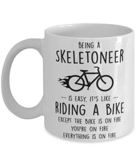 Funny Being A Skeletoneer Is Easy It's Like Riding A Bike Except Coffee Mug White