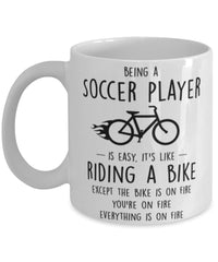 Funny Being A Soccer player Is Easy It's Like Riding A Bike Except Coffee Mug White