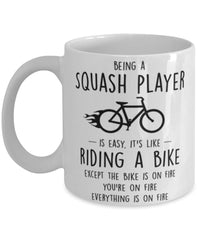 Funny Being A Squash Player Is Easy It's Like Riding A Bike Except Coffee Mug White