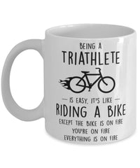 Funny Being A Triathlete Is Easy It's Like Riding A Bike Except Coffee Mug White