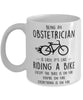 Funny Being An Obstetrician Is Easy It's Like Riding A Bike Except Coffee Mug White