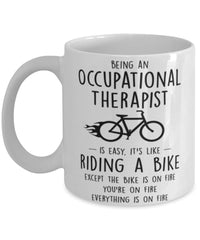 Funny Being An Occupational Therapist Is Easy It's Like Riding A Bike Except Coffee Mug White