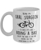 Funny Being An Oral Surgeon Is Easy It's Like Riding A Bike Except Coffee Mug White