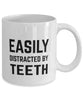 Funny Prosthodontist Dentist Orthodontist Mug Easily Distracted By Teeth Coffee Mug 11oz White