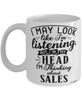 Funny Sales Representative Mug I May Look Like I'm Listening But In My Head I'm Thinking About Sales Coffee Cup White