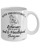 Oral Maxillofacial Surgeon Mug Never Underestimate A Woman Who Is Also An Oral Maxillofacial Surgeon Coffee Cup White