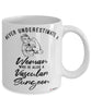 Vascular Surgeon Mug Never Underestimate A Woman Who Is Also A Vascular Surgeon Coffee Cup White